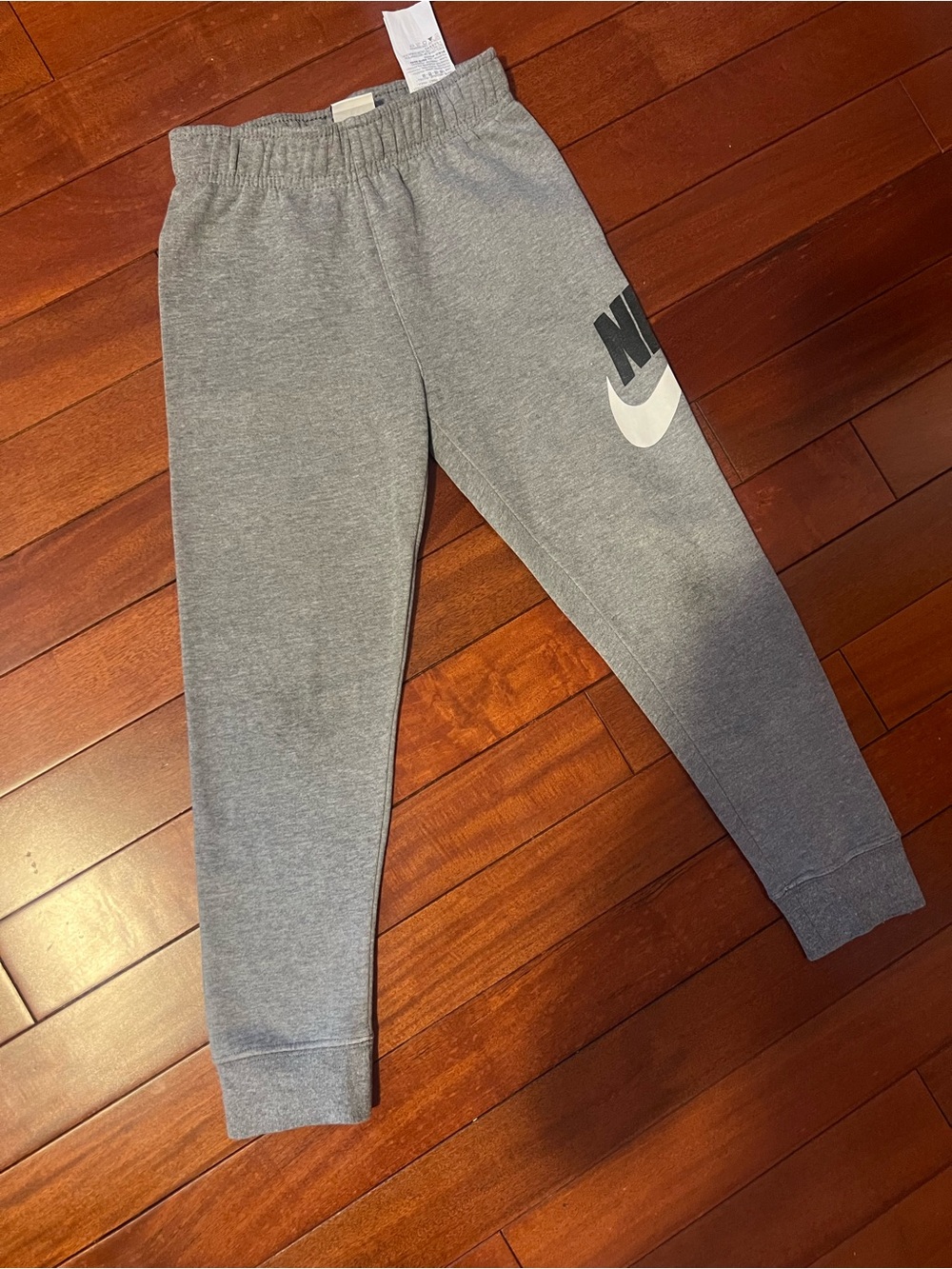Nike Grey Joggers with White Swoosh